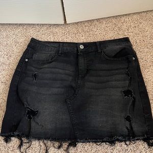 Black ripped denim skirt